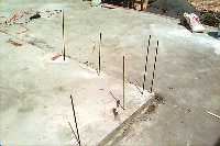 [rebar rods driled into slab]