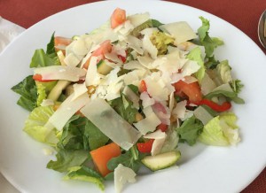 elite salad with parmesan shavings